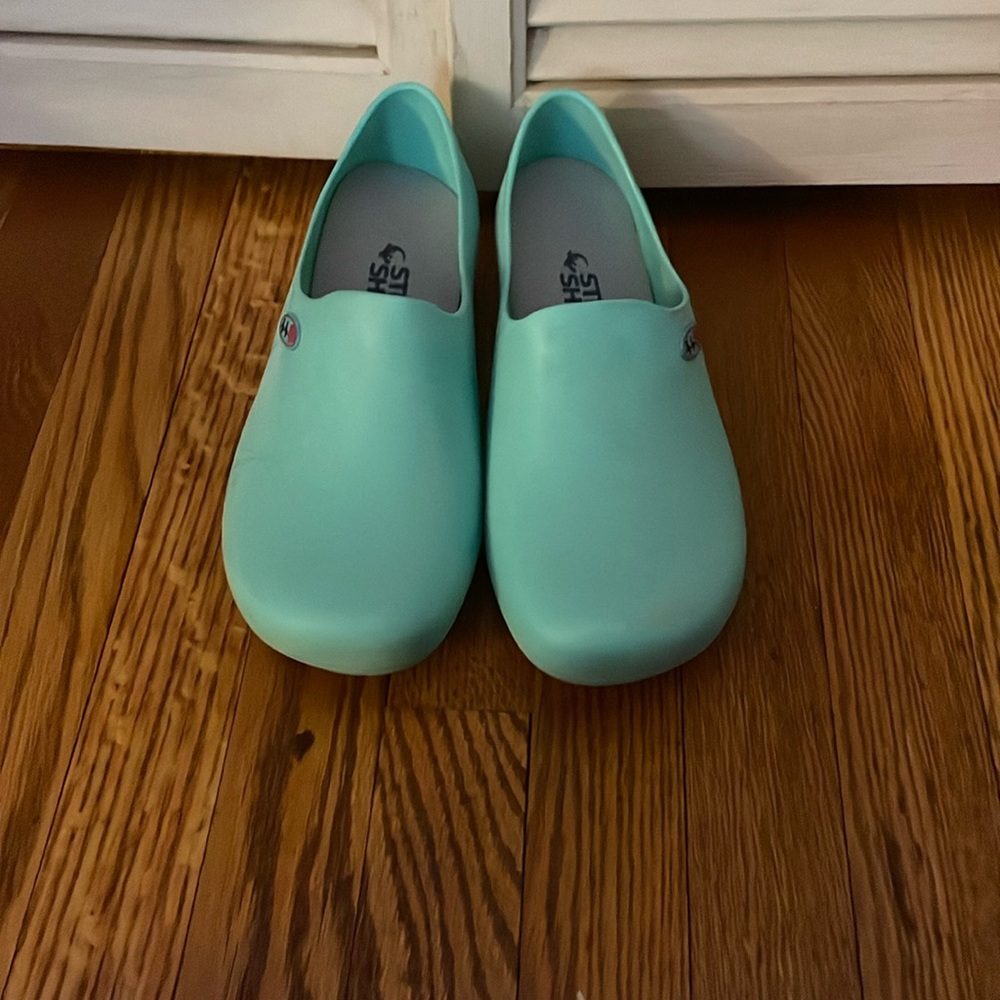 Surgical blue shoes.